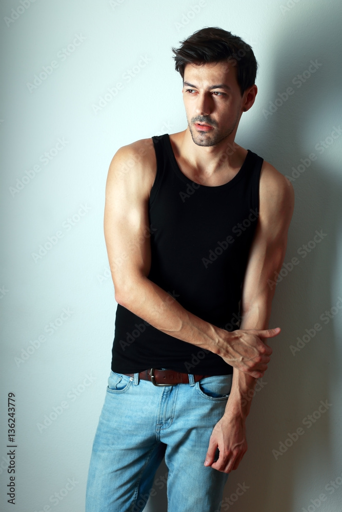 athletic man in black shirt athletic man in black shirt