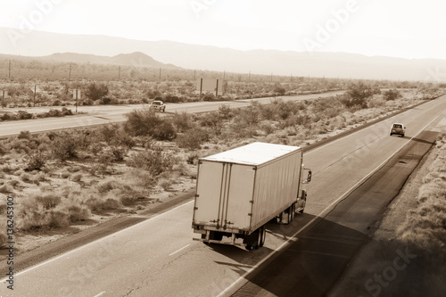 Cross-country traffic on Interstate I-10 through the desert in California