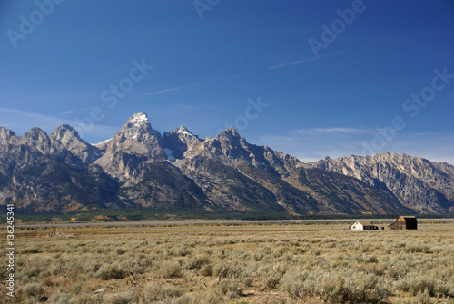 Western buildings with Tetons in background photo