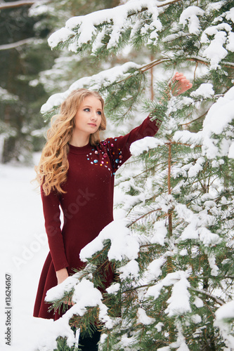 Girl in the winter forest.