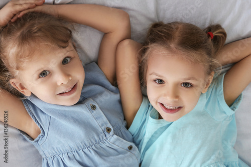 Adorable little sisters lyi...