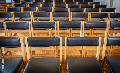 Empty chairs in the church