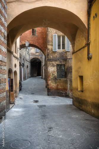 Alleys on a rainy spring day in a small magical village Siena  T