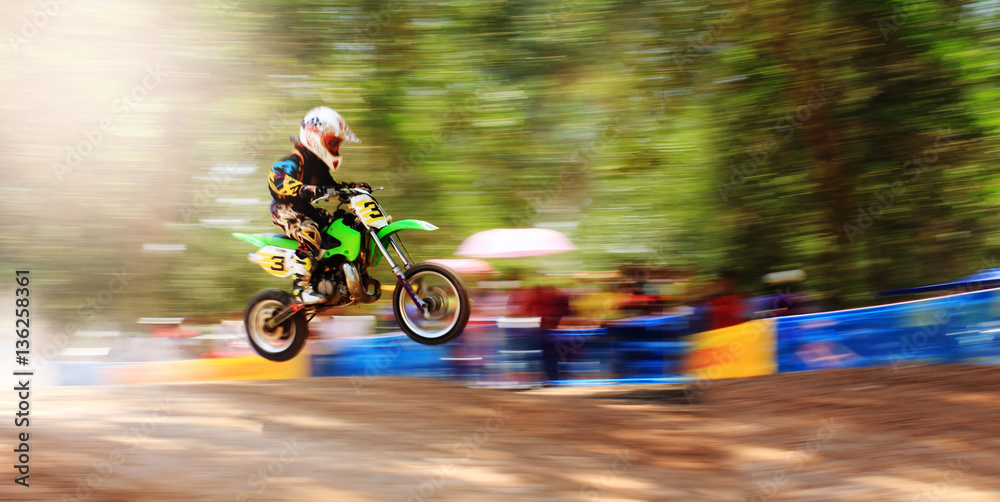 Motion blur of motocross Bike Jump,camera panning technique.