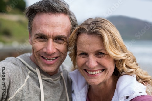 Portrait of mature couple on the beach