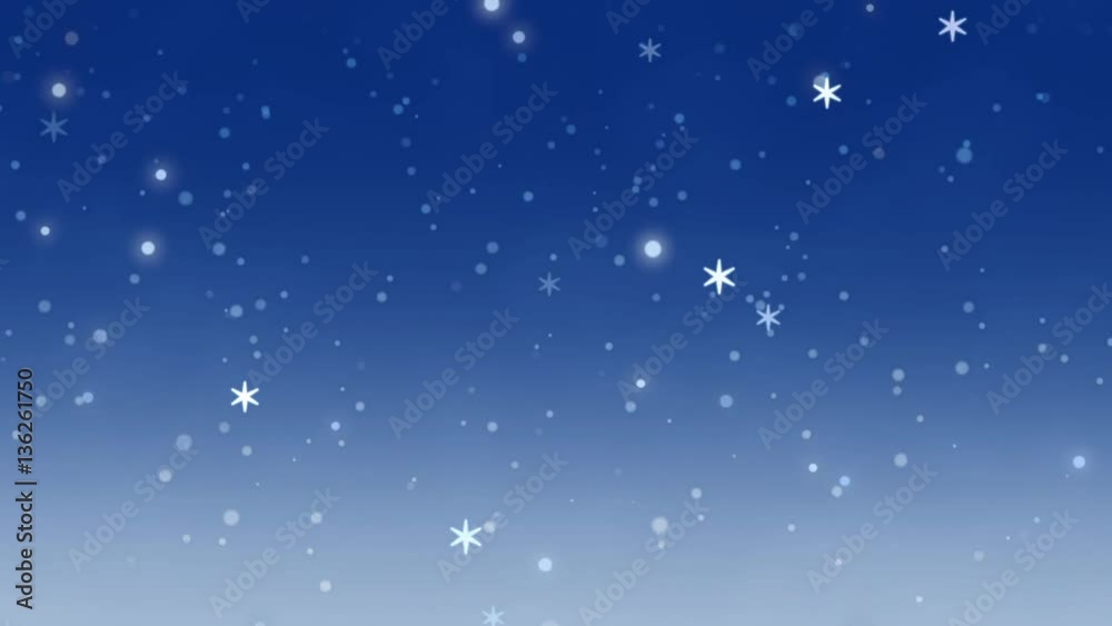Christmas background of winter snowflakes falling slowly down a blue, festive gradient