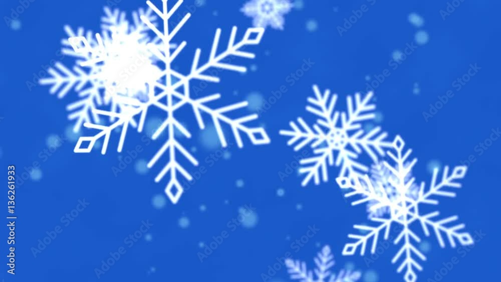 Christmas background of winter snowflakes falling slowly down a blue, festive gradient