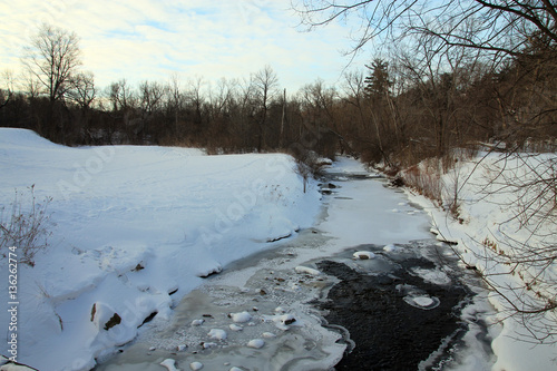 Winter landscape with frozen creek © Lucy 