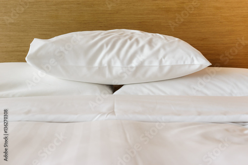 Fototapeta Naklejka Na Ścianę i Meble -  White pillows on the bed