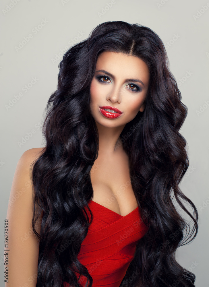 Glamorous Woman with Long Curly Hair