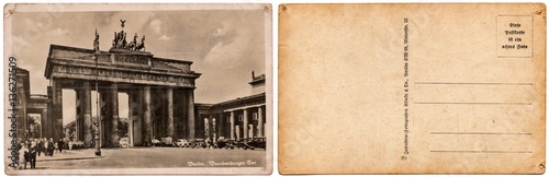 Vintage postcard with a picture of the old architecture, the Brandenburg Gate in Berlin, Germany, in 1935. Isolated on a white background. The front and back side.
