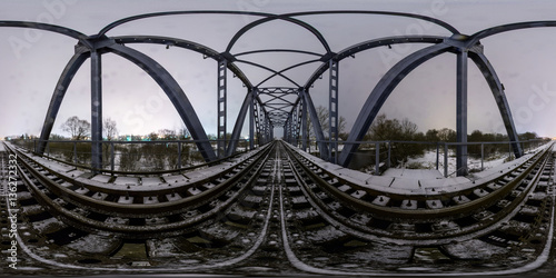 Full 360 degree equirectangula panorama night railway bridge