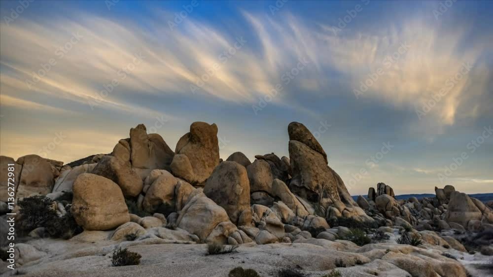 Sunset over the rocky terrain in California's Joshua Tree National park..
