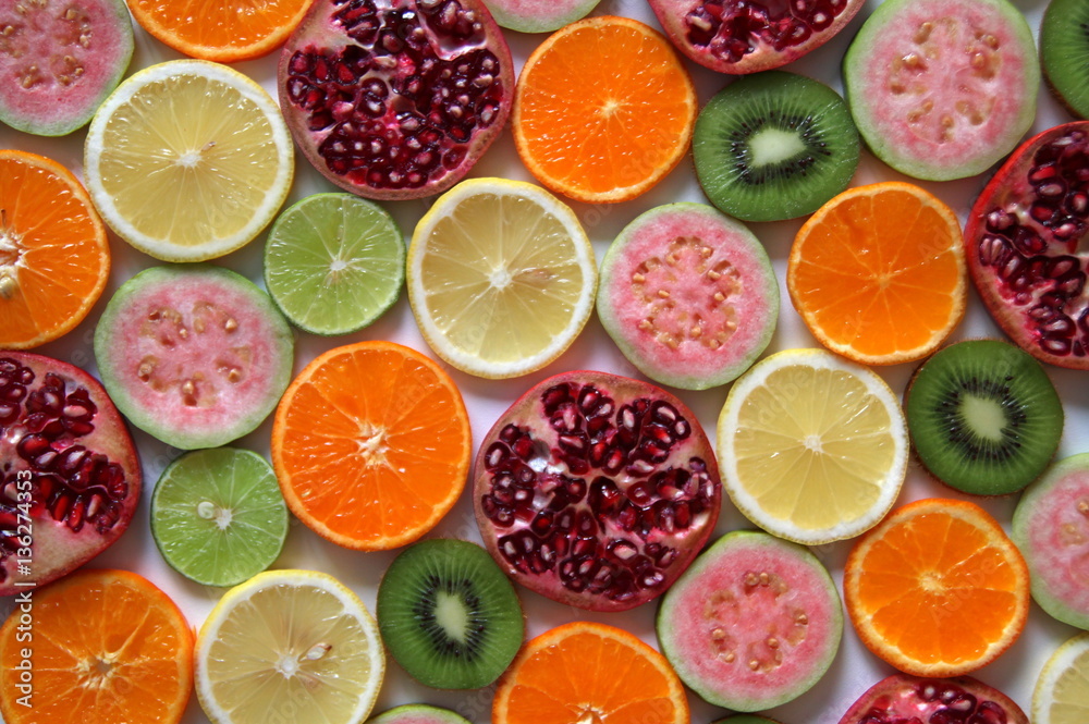 Mixed ripe and fresh fruits close up for background. Mixed ripe and fresh fruits close up for background.