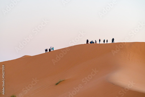 Sahara Desert , tourist Climbing 