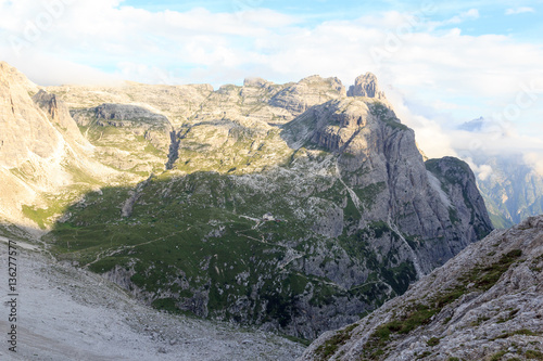 Mountain Einserkofel and alpine hut Zsigmondyhütte in South Tyrol, Italy photo