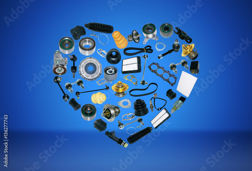 Heart spare auto parts for car on blue background. Set with many isolated items for shop or aftermarket, OEM