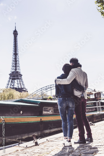Multi-ethnic Couple Having Fun In Paris Near Eiffel Tower © nullplus