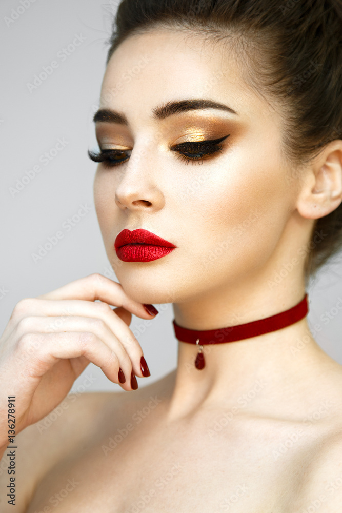 Beautiful woman portrait with red lips and red manicure. Beautiful woman portrait with red lips and red manicure.