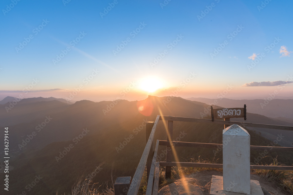 Sunset scene with the peak of mountain and cloudscape at Phu chi fa in Chiang rai,Thailand Sunset scene with the peak of mountain and cloudscape at Phu chi fa in Chiang rai,Thailand