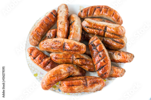 Sausages grill on a white background. Isolated