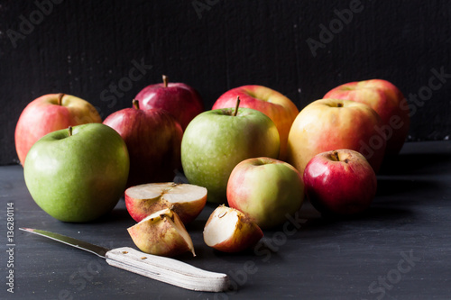 apples on a black background photo