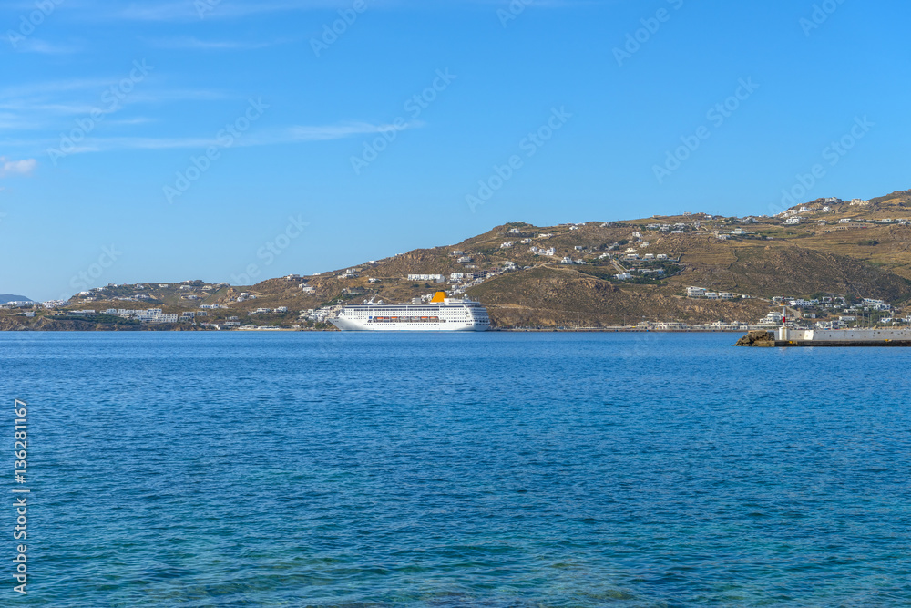 Luxurious cruise ships at the port of Mykonos, Cyclades, Greece.