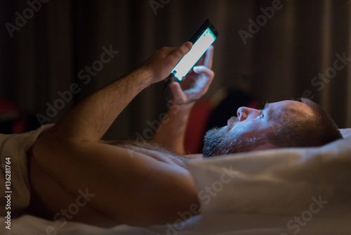 Texting in a bed