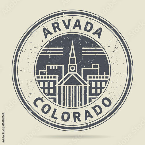 Grunge rubber stamp or label with text Arvada, Colorado