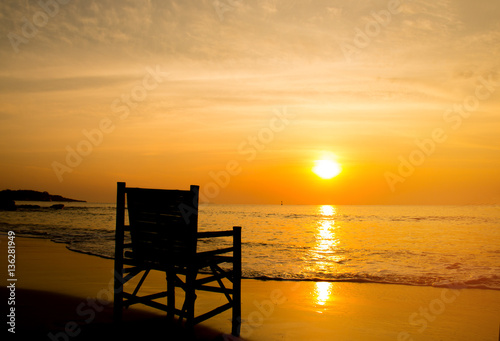 beach chair loungers on deserted coast sea at sunrise, Vacation