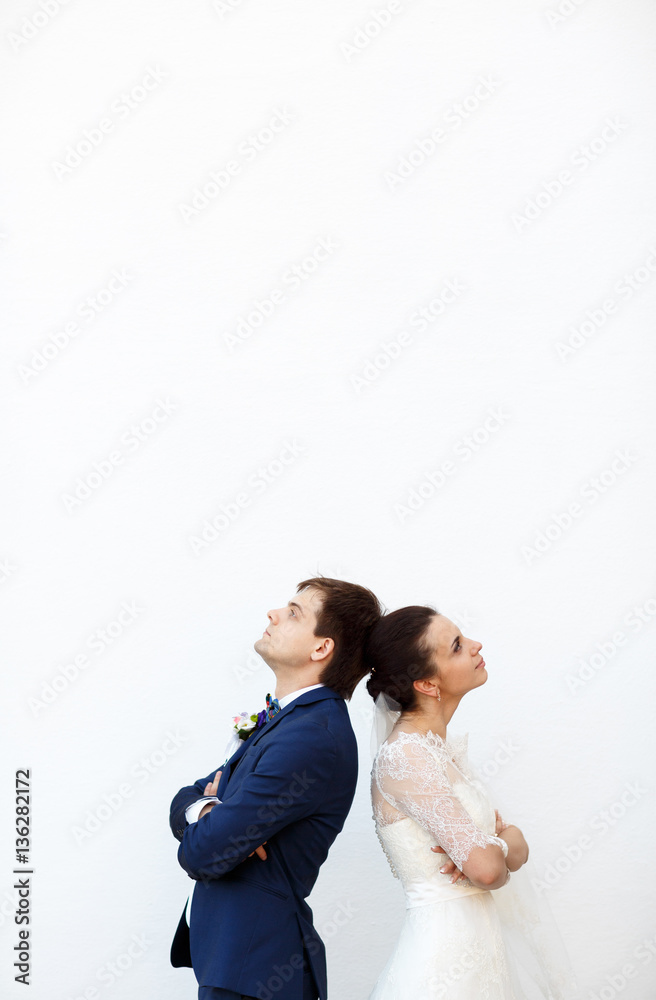 creative bride and her charming man posing for the camera creative bride and her charming man posing for the camera