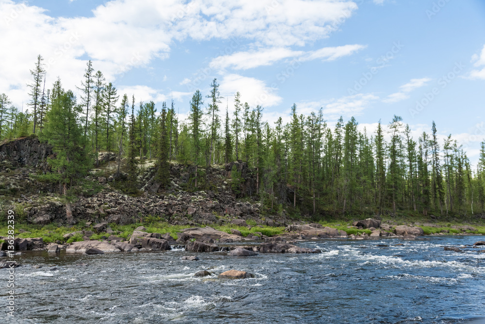 Beautiful cliffs and rapids on the river. Eastern Siberia. Krasnoyarsk territory. Beautiful cliffs and rapids on the river. Eastern Siberia. Krasnoyarsk territory.