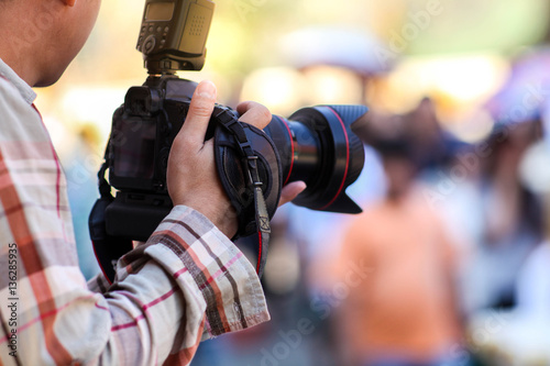 Photographer and digital camera. photo