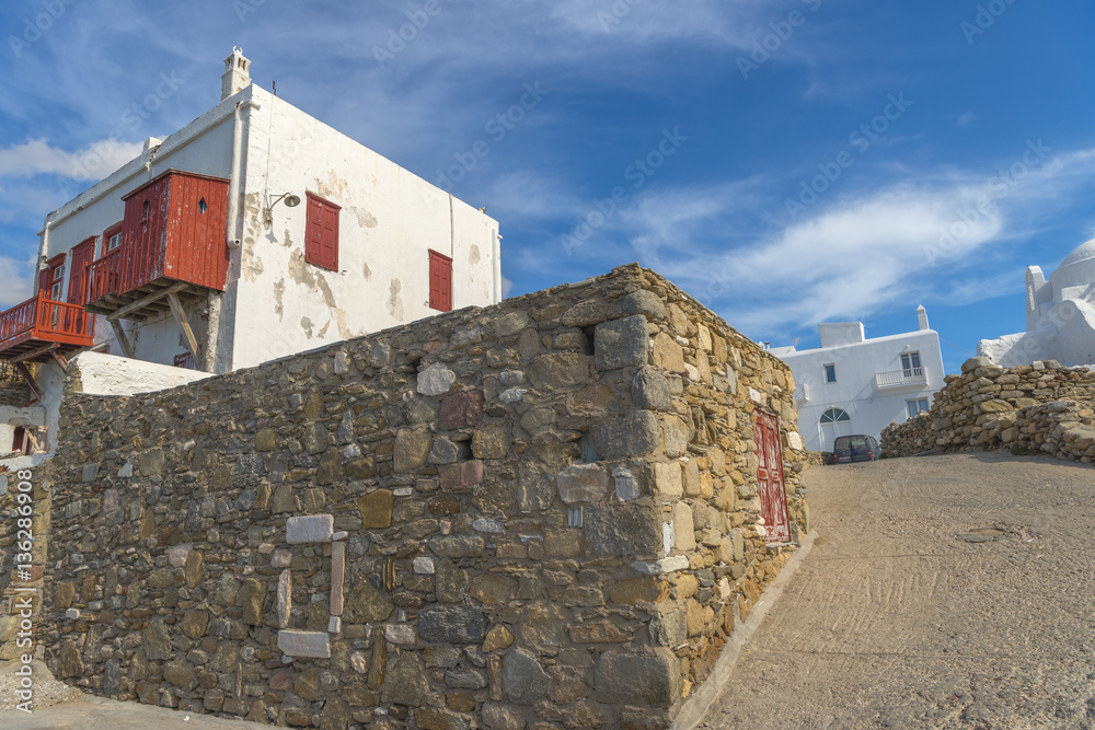 Traditional white houses at the narrow streets of Mykonos, Cycla