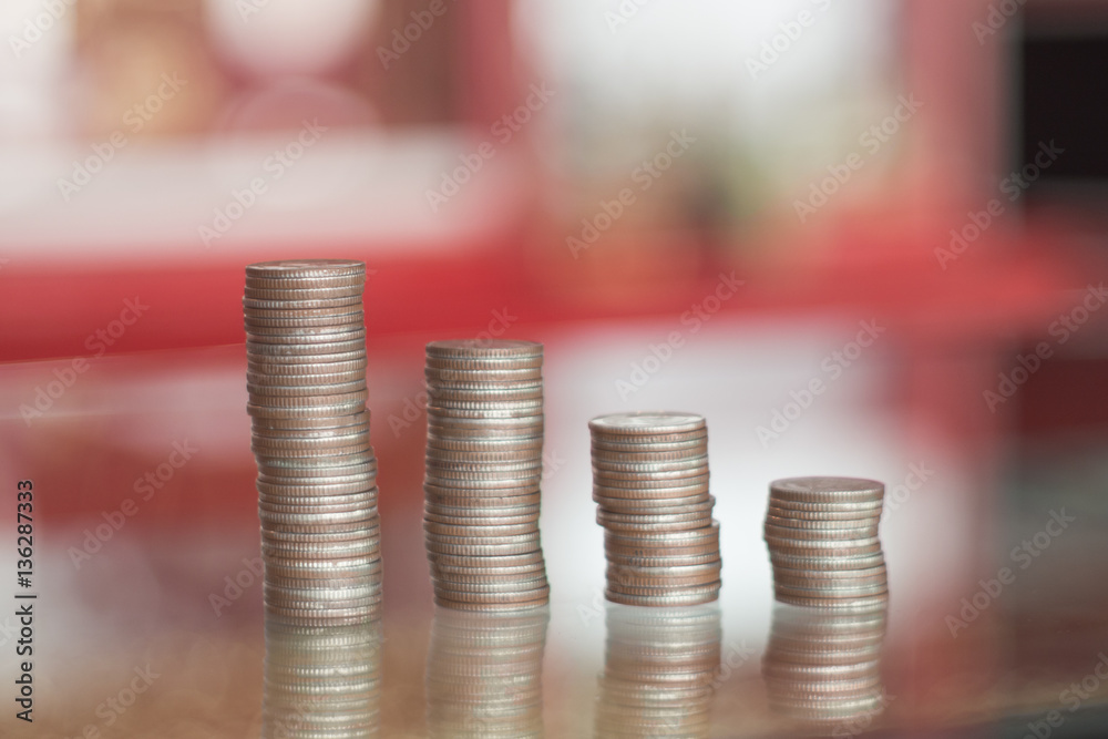 Stack of coins calculator money plan natural blurr background Stack of coins calculator money plan natural blurr background