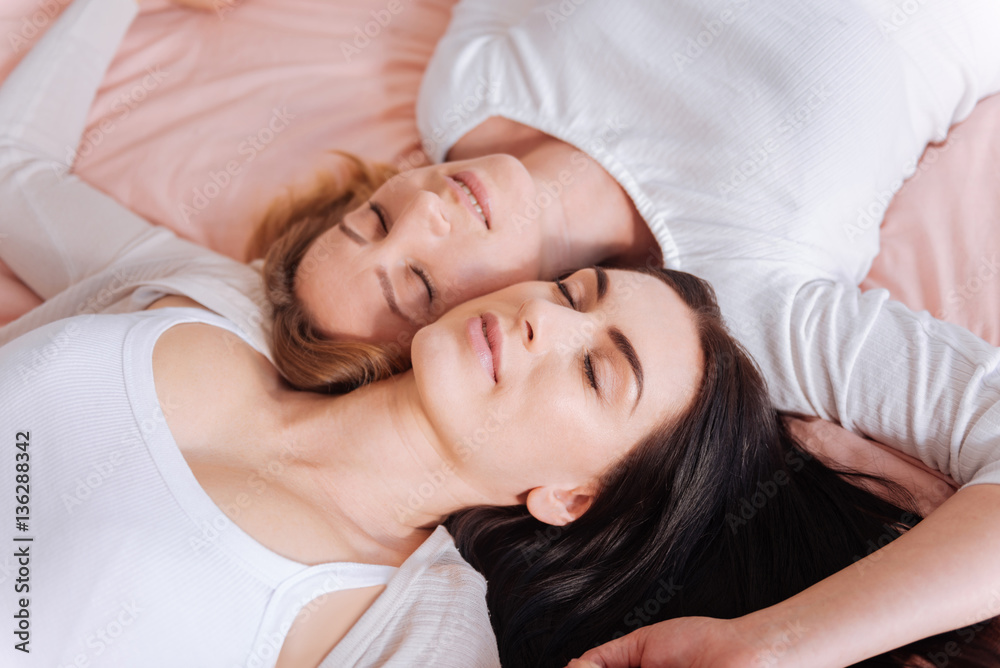 Relaxed attractive women lost in a daydream Relaxed attractive women lost in a daydream