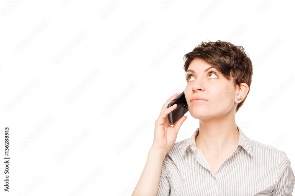 woman with a phone looking at white space background woman with a phone looking at white space background