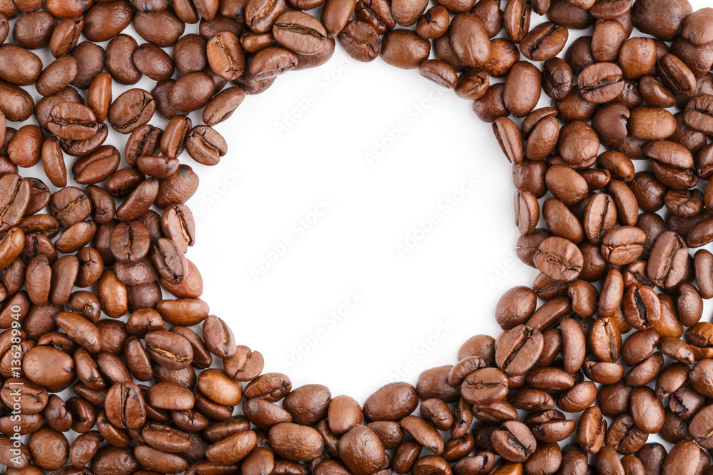roasted coffee beans isolated in white background. Roasted coffee beans background close up. Coffee beans pile from top on white background with copy space for text. Good morning. roasted coffee beans isolated in white background. Roasted coffee beans background close up. Coffee beans pile from top on white background with copy space for text. Good morning.