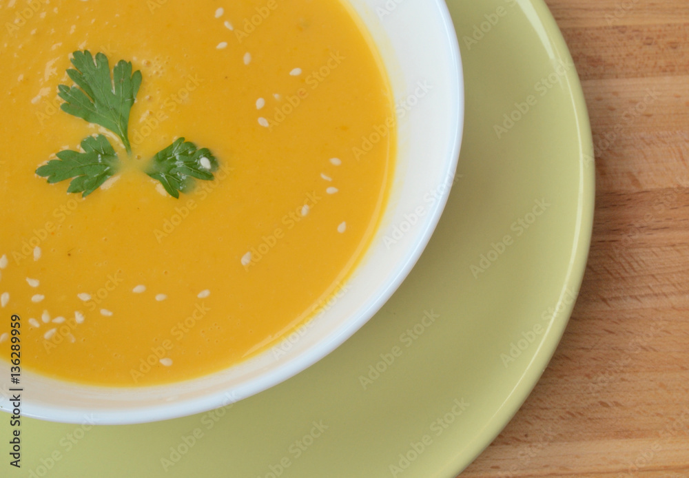 soup pureed pumpkin is in a plate soup pureed pumpkin is in a plate
