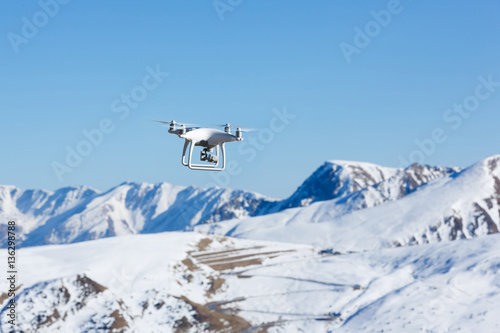Flying drone in mountain
