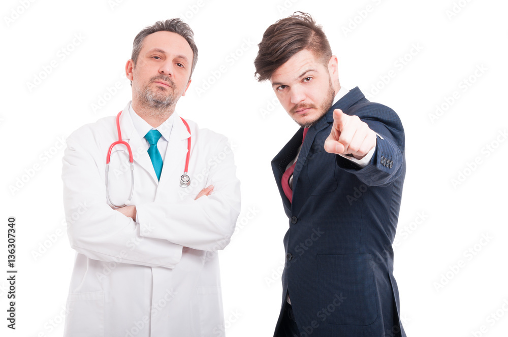 Businessman doing blame gesture and pointing you Businessman doing blame gesture and pointing you