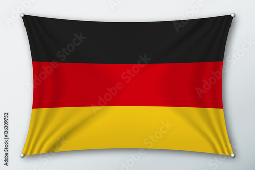 Germany national flag. Symbol of the country on a stretched fabric with waves attached with pins. Realistic vector illustration.