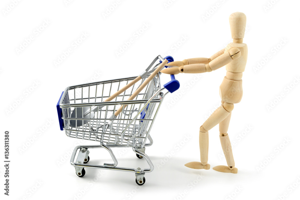 wooden mannequin shopping garden tools with a cart on white isol wooden mannequin shopping garden tools with a cart on white isol