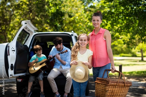 mother and daughter standing with picnic basket  © WavebreakMediaMicro