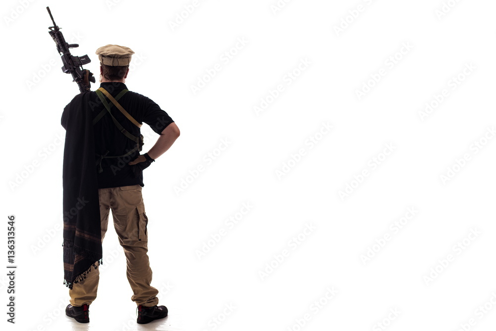 man in military outfit CIA agent, which is similar to the clothing of a  warrior Mujahedin, in modern times on a white background in studio Stock  Photo | Adobe Stock