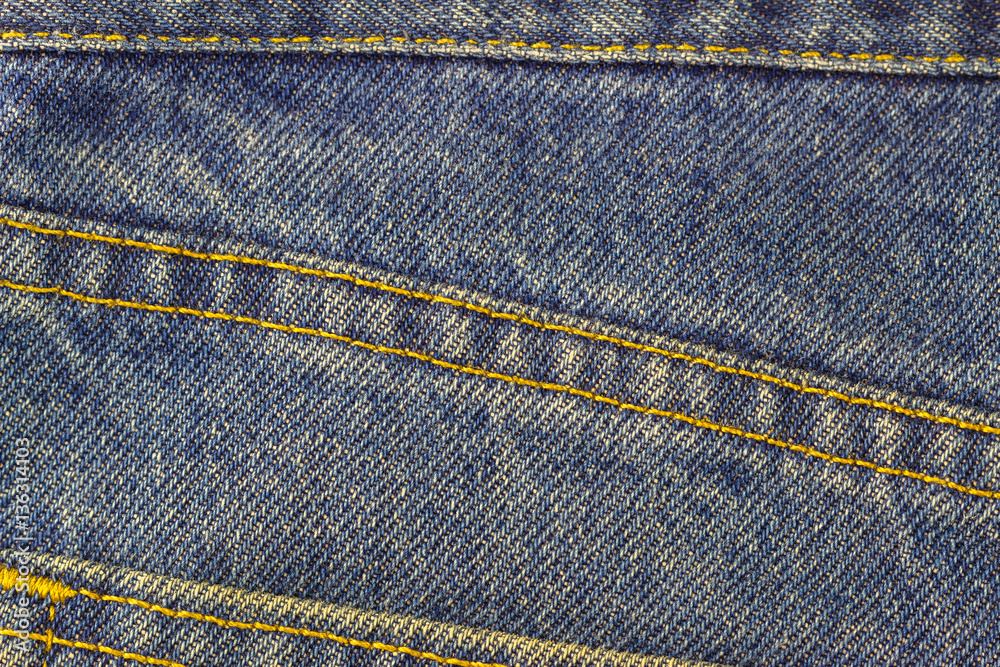 Blue jeans with seam, denim texture background, close up. Blue jeans with seam, denim texture background, close up.