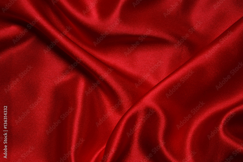 Red cloth waves background texture.