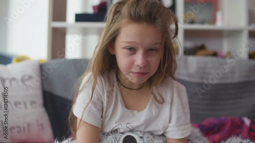 Little girl coughing at home