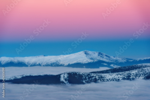 Incredible views of the mountain range winter sunset