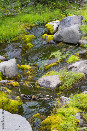 A small stream in northern Siberia. Water among rocks. Krasnoyarsk territory.